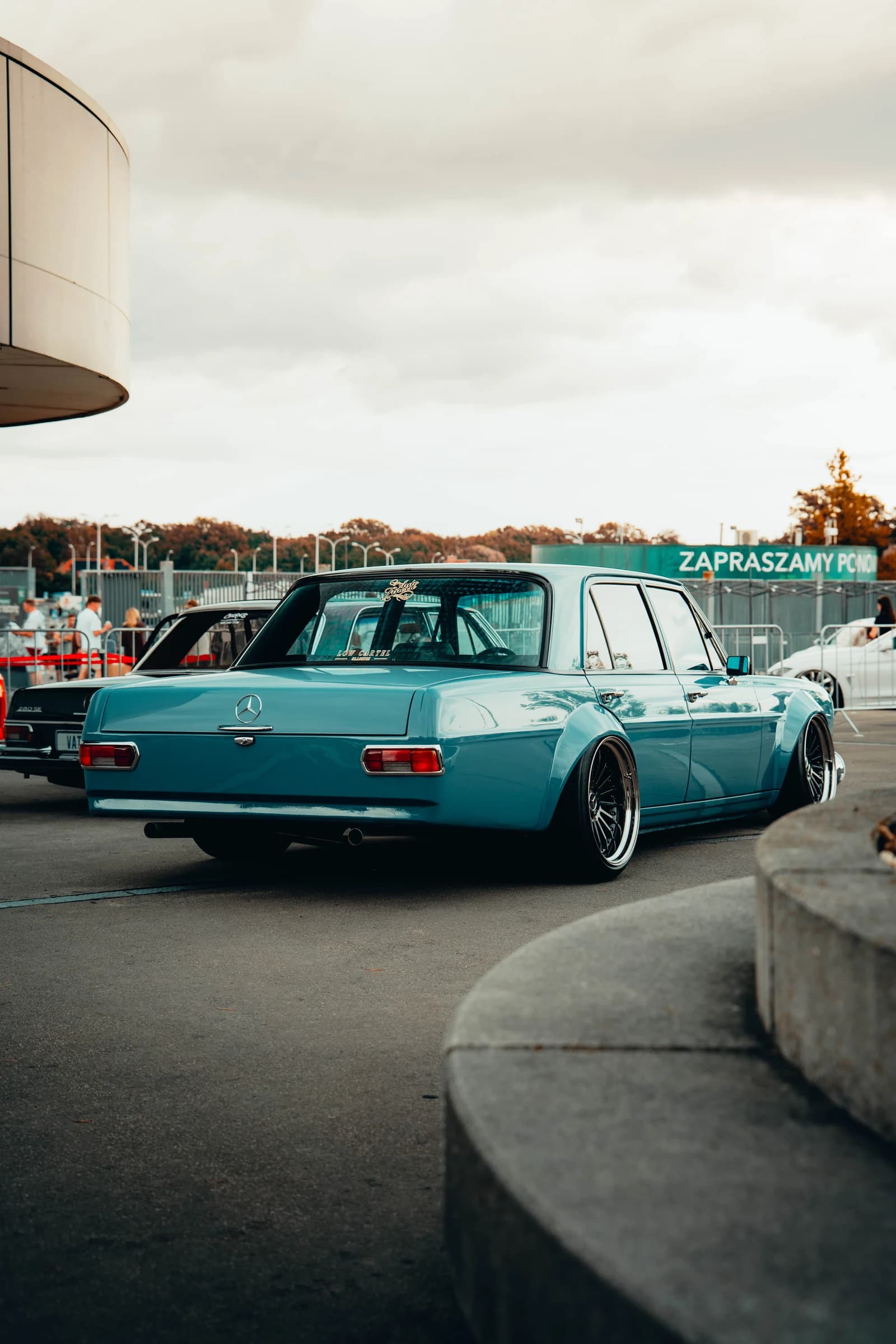 Turquoise classic wagon displayed outside Tarczyński Arena in Wrocław