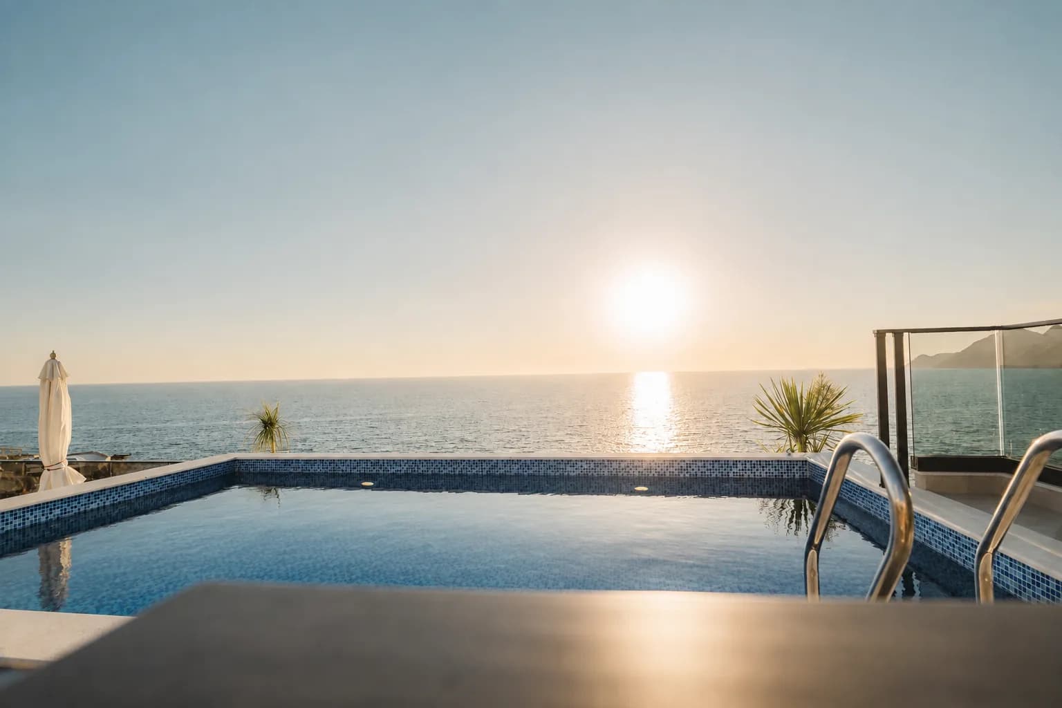 Pool overlooking the Adriatic Sea at sunset
