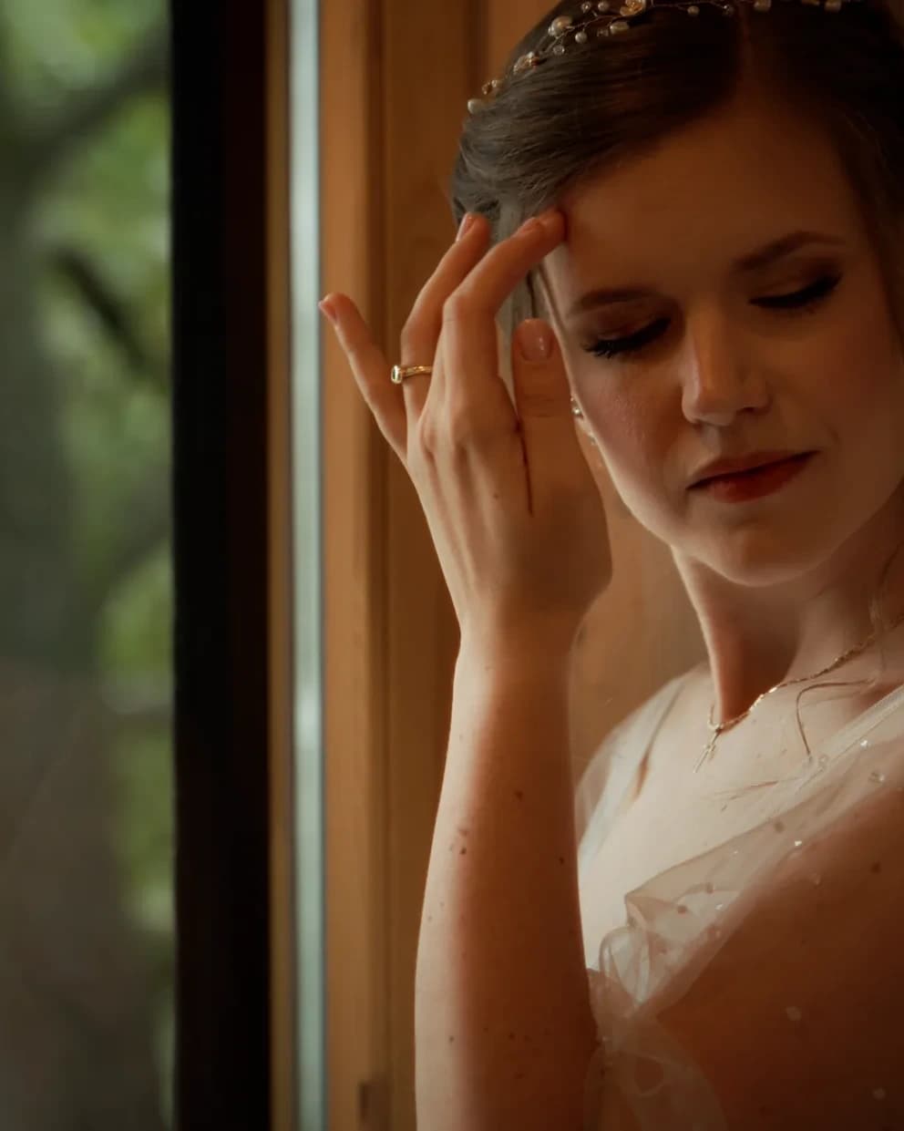 Close portrait of Dia during the final moments of getting ready