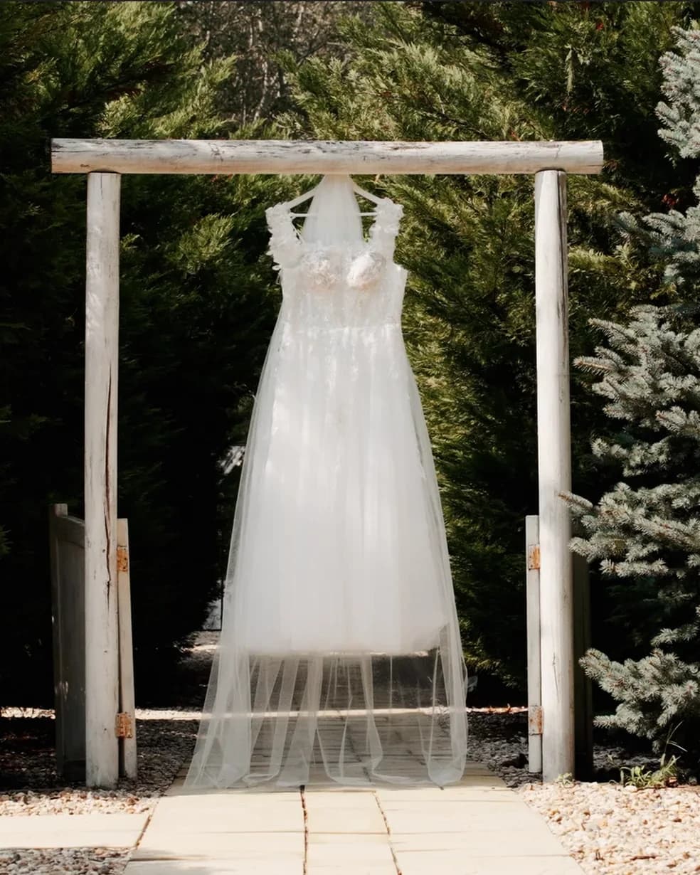 Fanni’s wedding dress hanging outdoors before the ceremony